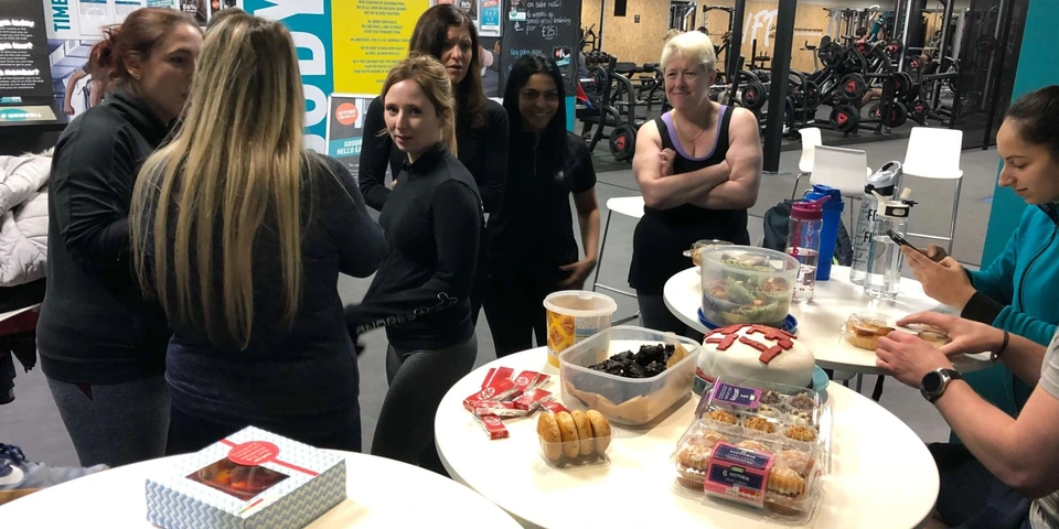 MetFit members sharing food and conversation after a class